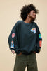 Daydreamer Ski Patches & Pass Oversized Crewneck Sweatshirt